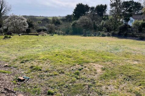 ACROSS PLOT TO SOUTH