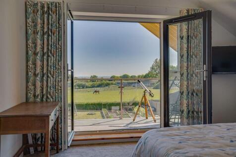 Principle bedroom view to balcony