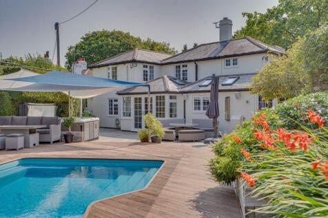 Rear of Property with Pool and Decking 