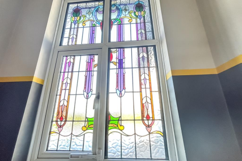 Landing Stained Glass Window