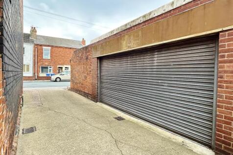 Double Garage to Rear