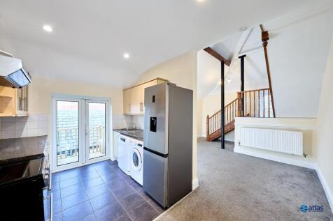 Living Area And Kitchen