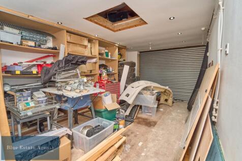 Garage With Shutter For Parking Access