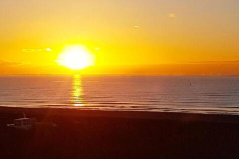 beach hut sunset.jpg