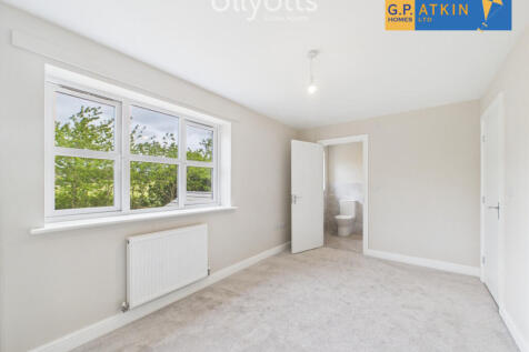 Bedroom with logo