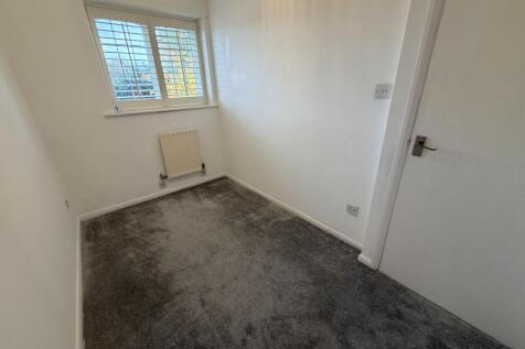 Bedroom facing the back of the house