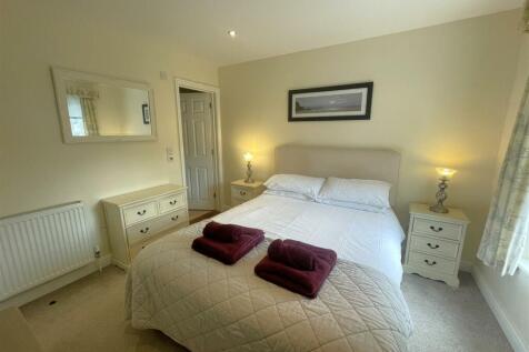 Bedroom one 1.JPG