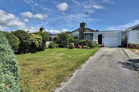 property with front garden and parking.jpg
