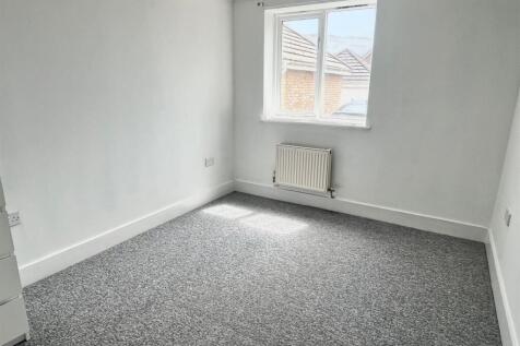 Bedroom 2 lightened.jpg