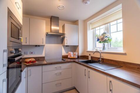 Contemporary kitchen with built in appliances