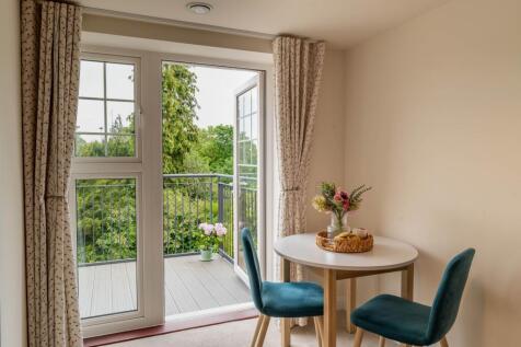 Dining area leading to balcony