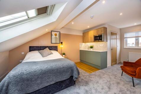 Bedroom With Kitchenette