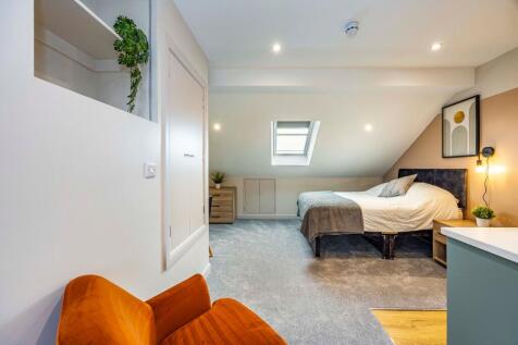 Bedroom With Kitchenette
