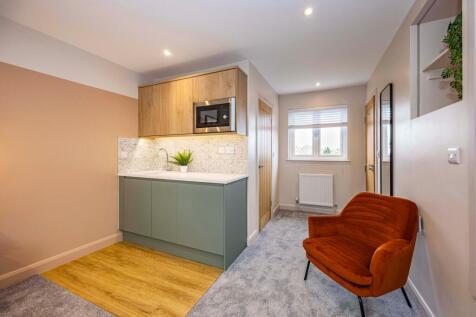 Bedroom With Kitchenette