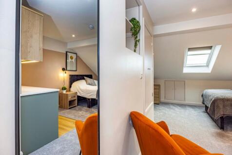 Bedroom With Kitchenette