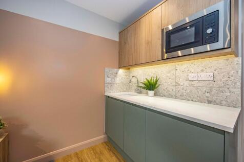 Bedroom With Kitchenette