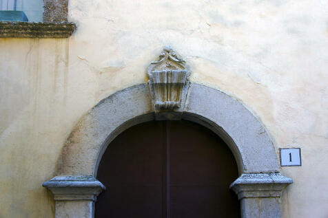 Crest above door