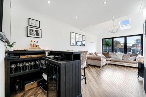 100 Tithebarn Road family room.jpg