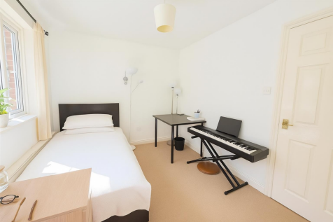 Bright, Serene Bedroom with Piano.png