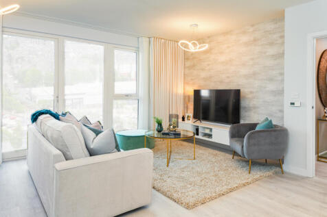 Apartment interior with large living area window