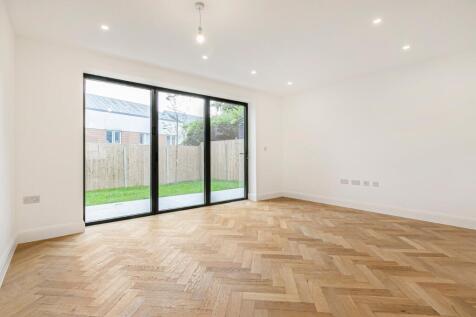 property in Grand Drive, 
Raynes Park, SW20