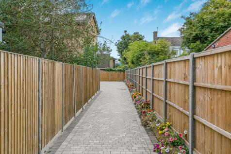 property in Grand Drive, 
Raynes Park, SW20