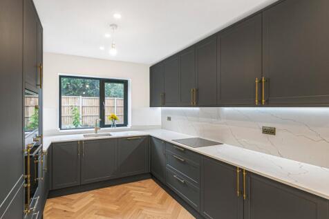 property in Grand Drive, 
Raynes Park, SW20
