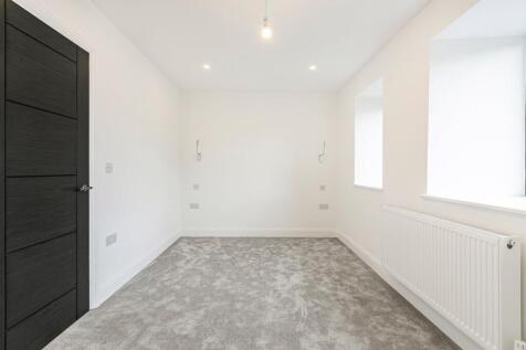 property in Grand Drive, 
Raynes Park, SW20