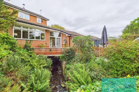 Picturesque Garden with Footbridge,