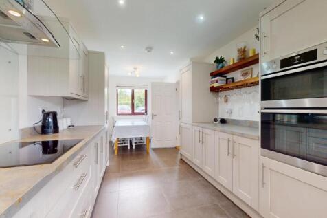 EXTENDED THROUGH KITCHEN/DINING ROOM