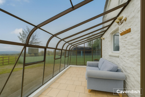 HOLIDAY COTTAGE- SUNROOM