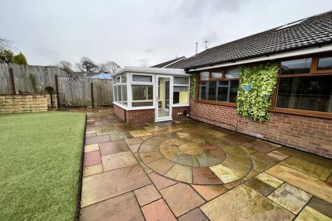 Rear patio and ga...
