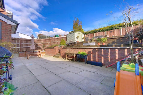 Rear patio and ga...