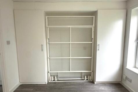 Wardrobe and Pull Down Bed Frame