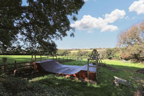 Garden half pipe and swings