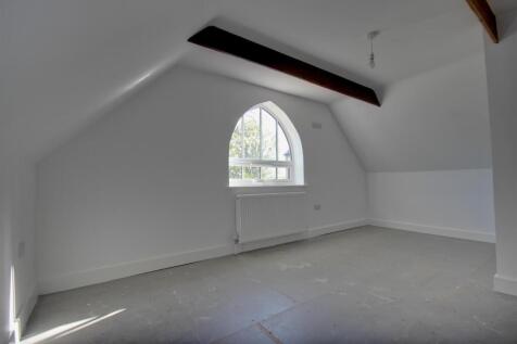 Arched window feature in annex