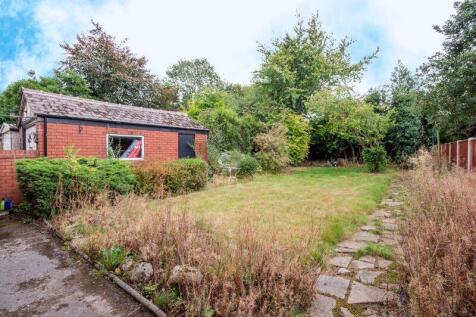 REAR GARDEN AND GARAGE