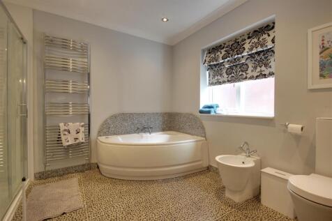 En-suite bath and shower room