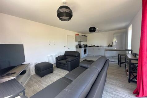 Living Room with Kitchen Area