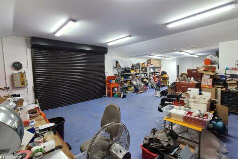 First Integrated Outbuilding / Garaging