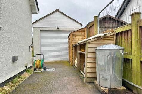 To The Side OF The Property