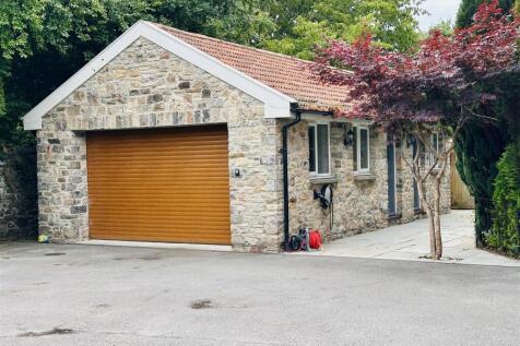 Garage/Worktop and Gym