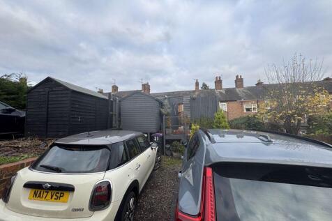 Two rear parking spaces