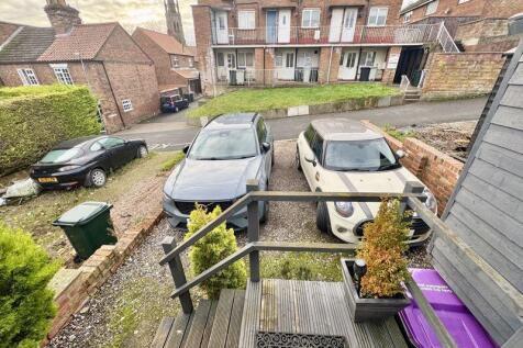 Rear parking spaces