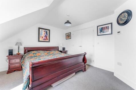 1.9 - principal bed with doors to dressing room.jp