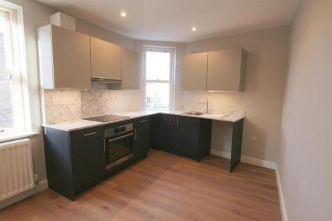 LIVING AREA AND KITCHEN