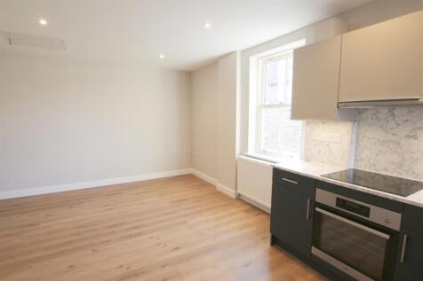 LIVING AREA AND KITCHEN