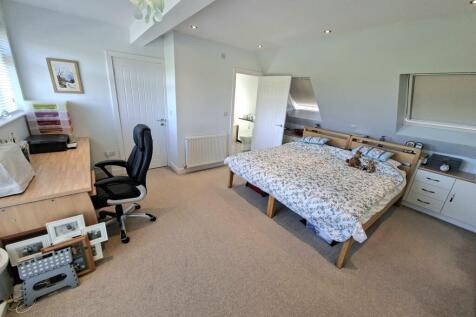 BEDROOM ONE AND EN-SUITE BATHROOM