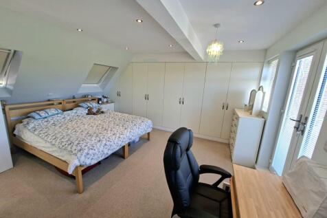 BEDROOM ONE AND EN-SUITE BATHROOM