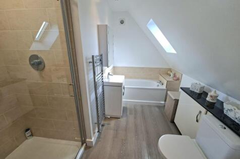 BEDROOM ONE AND EN-SUITE BATHROOM
